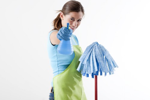 Team preparing for a safe deep cleaning job with protective equipment and supplies