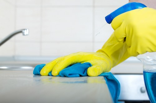 Professional cleaning team reviewing a booking checklist